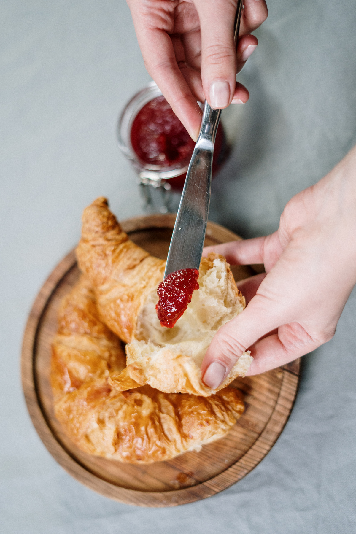 Person Holding A Knife With Jam